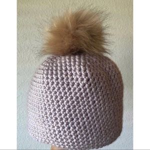 Crochet beanie with poof